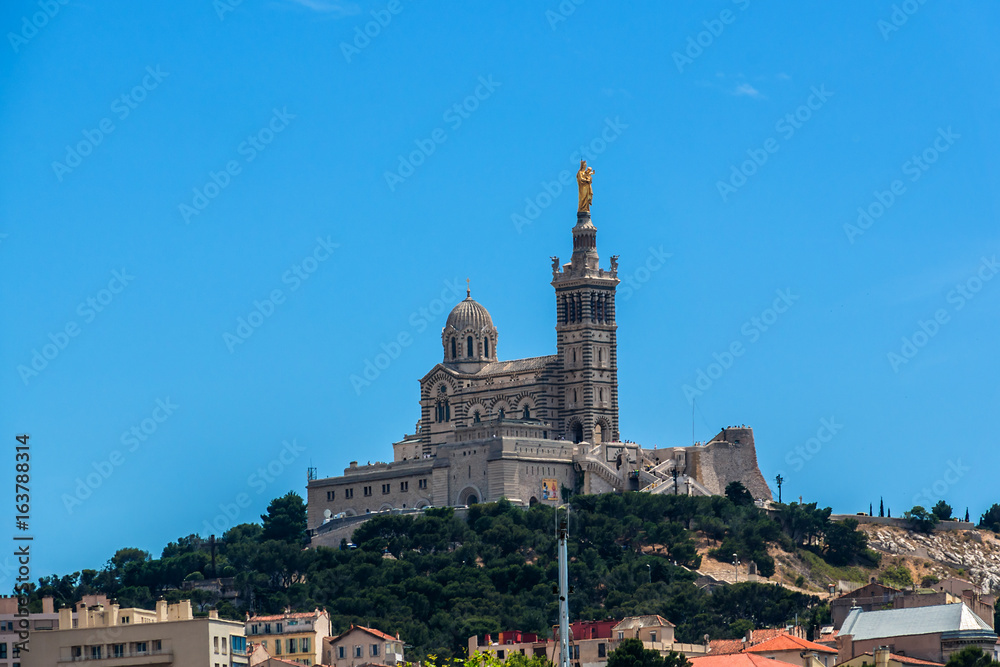 Neo-Byzantine Basilica of Notre-Dame de la Garde (Our Lady of the Guard, architect Henri-Jacques Esperandieu, 1864) in Marseille, is city's best-known symbol. Provence-Alpes-Cote d'Azur, France.