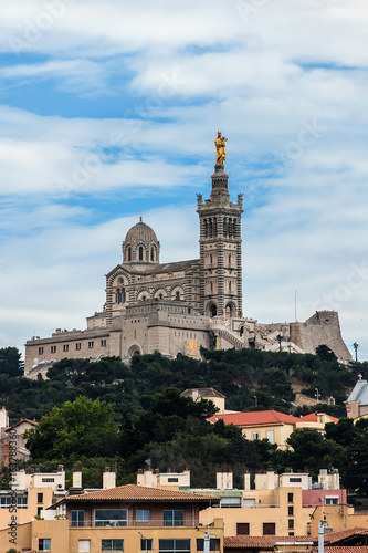 Neo-Byzantine Basilica of Notre-Dame de la Garde (Our Lady of the Guard, architect Henri-Jacques Esperandieu, 1864) in Marseille, is city's best-known symbol. Provence-Alpes-Cote d'Azur, France.