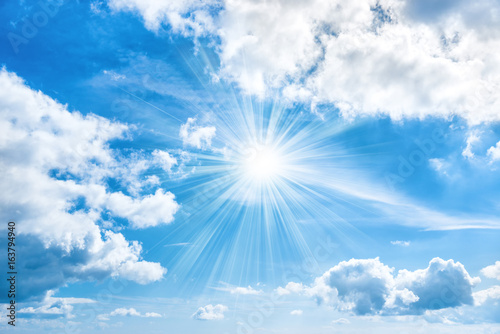 Photography Sun with sunrays shining on blue sky