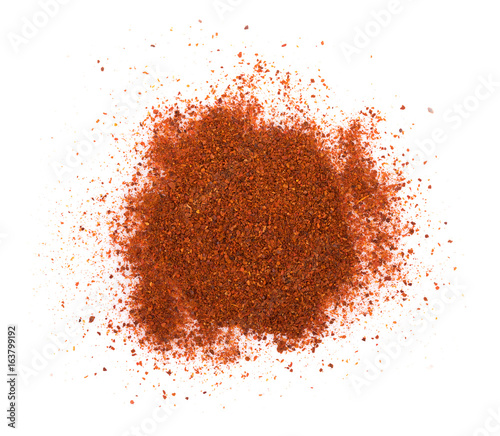Obraz na plátne Pile of red paprika powder isolated on white background