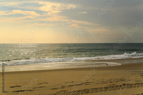 Beach scene in Nags Head NC sunrise on a clear blue day