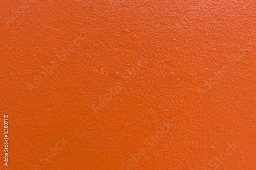 Orange concrete wall texture background;