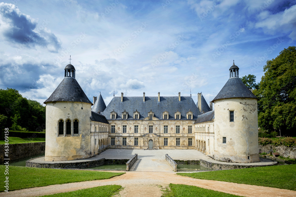The castle of Bussy-Rabutin makes cohabit several epochs. Its façade dates from the 17th century, the ground floor of Louis XIII and the floors of 1649. Burgundy, France. 