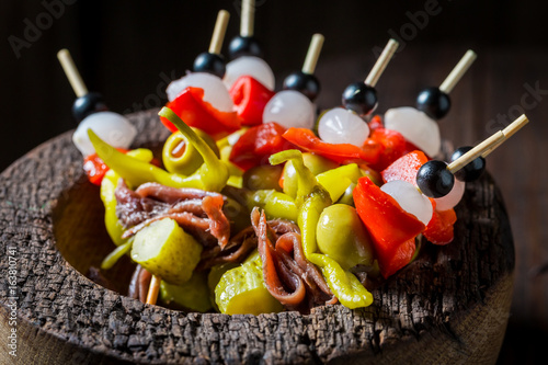 Closeup of banderillas with fresh ingredients for spanish corrida photo