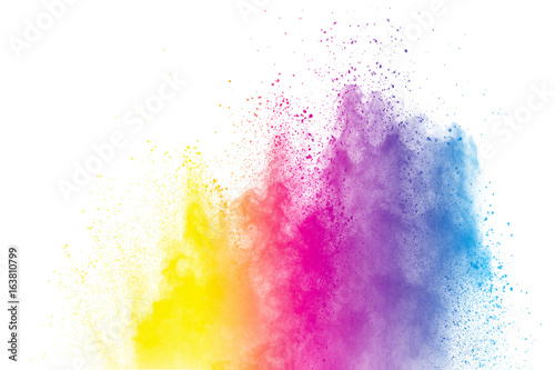 abstract colored powder splatted on white background,Freeze motion of color powder exploding © Pattadis