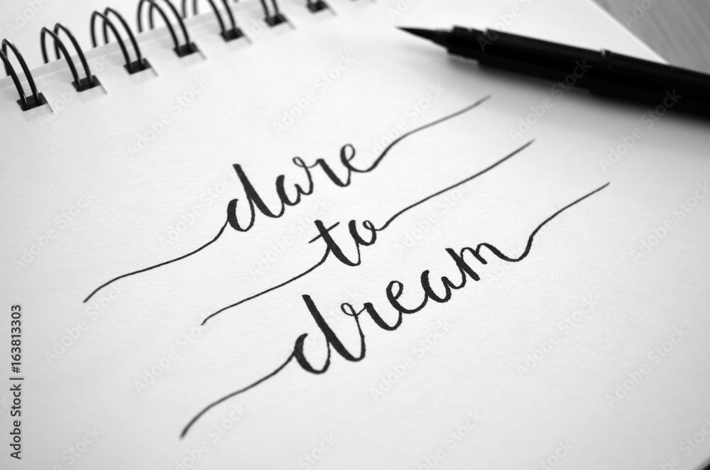 DARE TO DREAM hand lettered in notebook DARE TO DREAM hand lettered in notebook