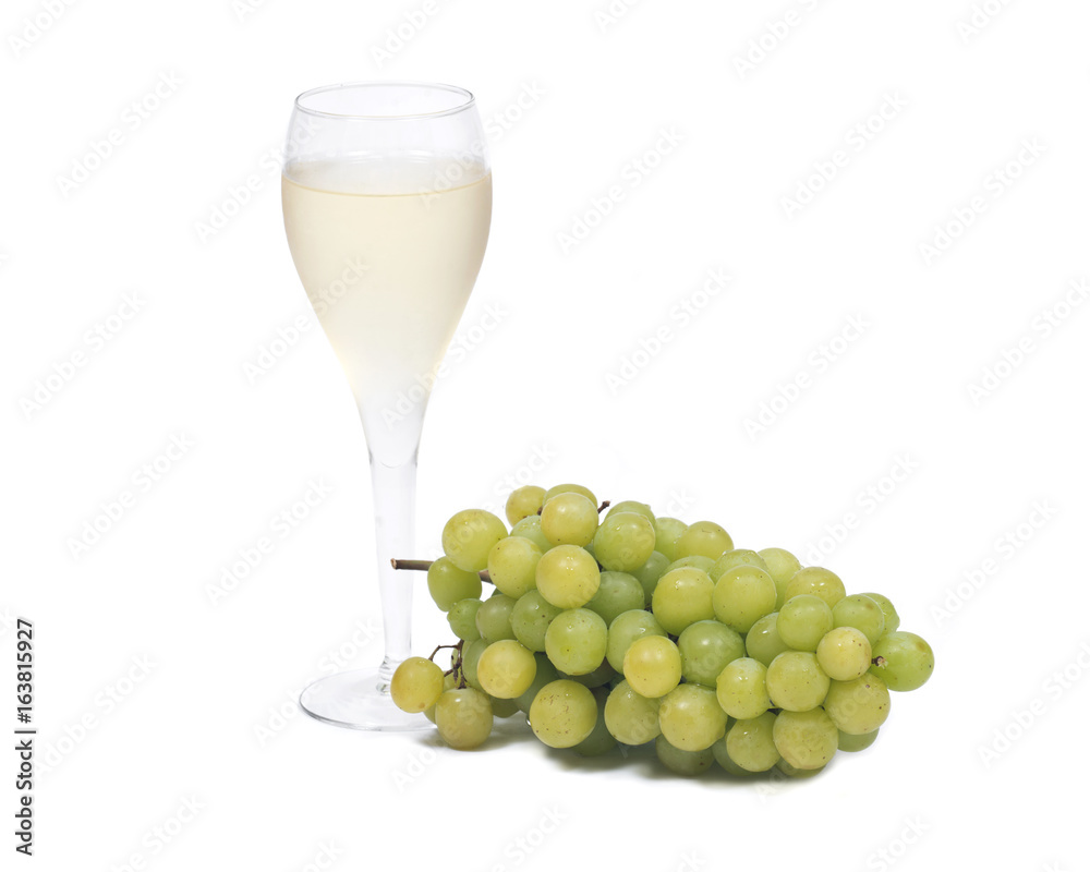 Glass of white wine and ripe organic green grapes isolated on white background Glass of white wine and ripe organic green grapes isolated on white background