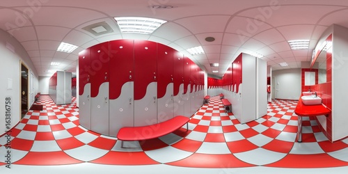 Foto Colorfull cloakroom for women with red white metal cage lockers with bench in a