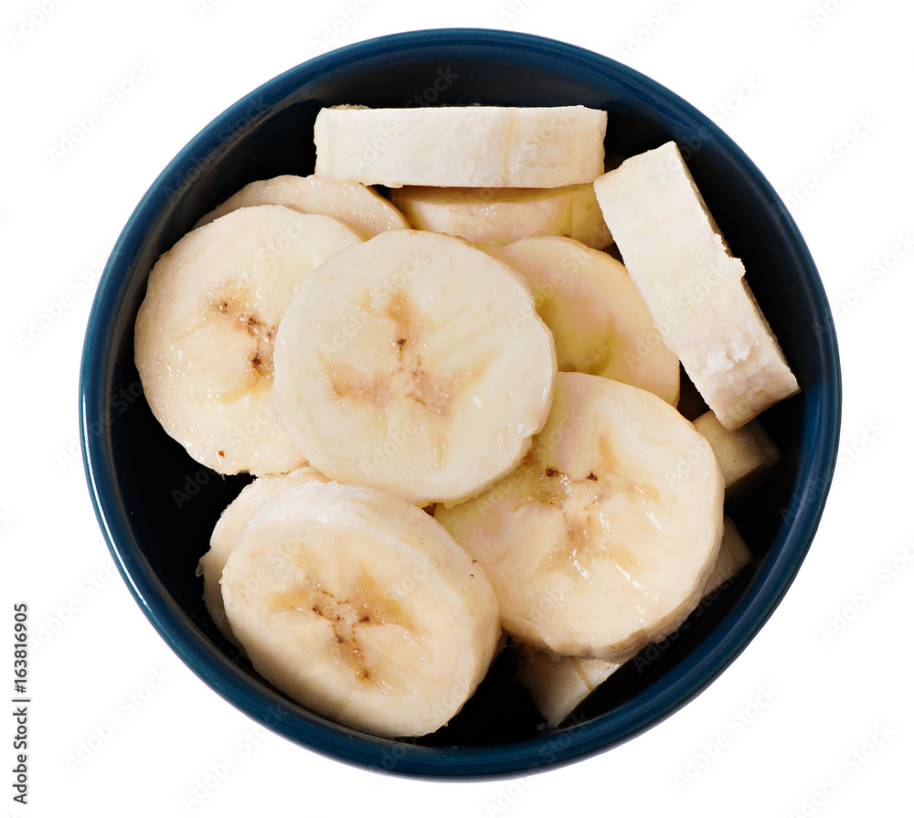 Banana sliced into slices isolated on white background, top view.