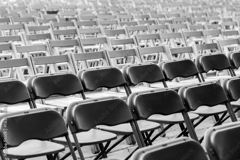 Naklejka premium Monochrome rows of chairs