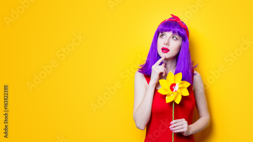 girl with pinwheel toy