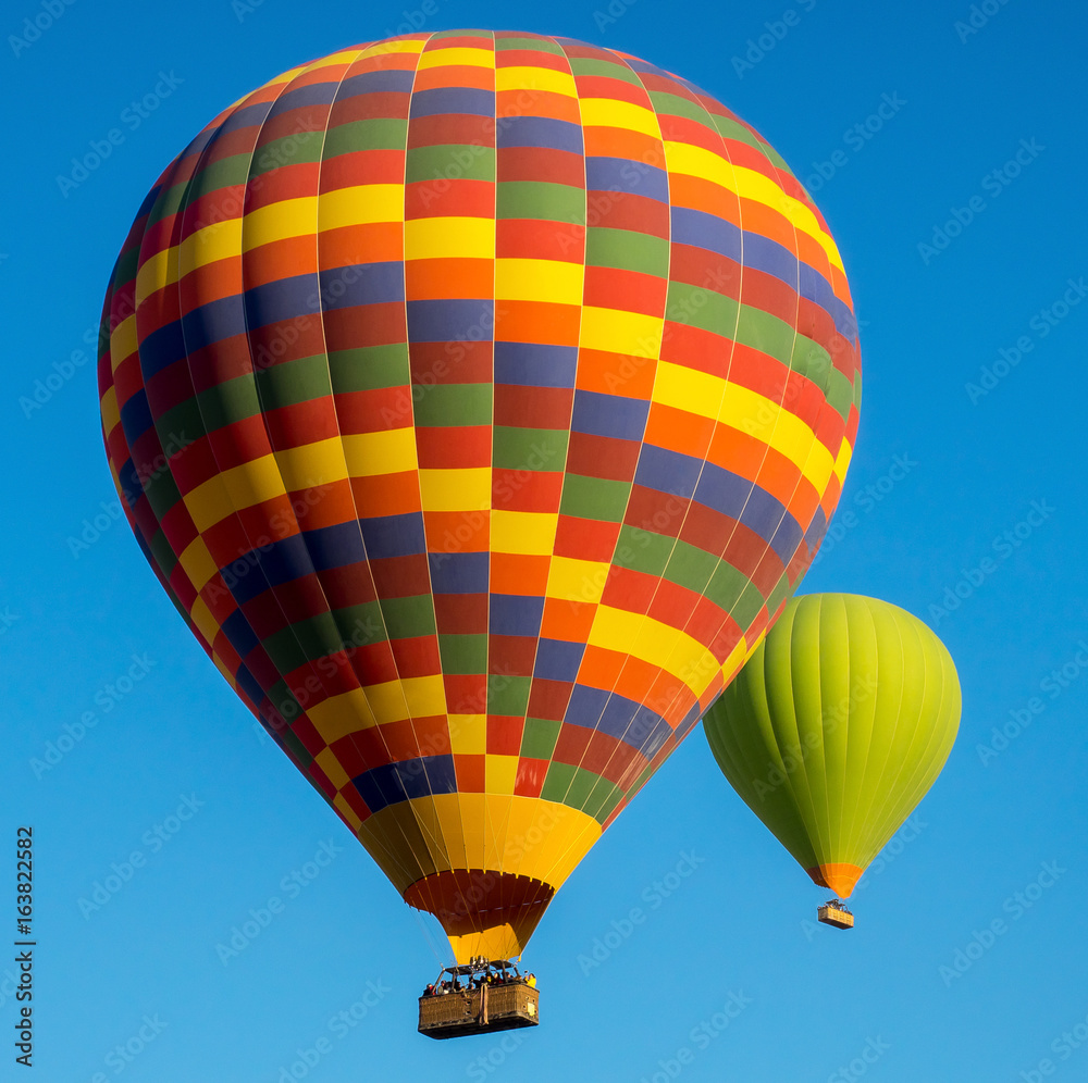 Fototapeta premium Colored hot air balloons on blue sky