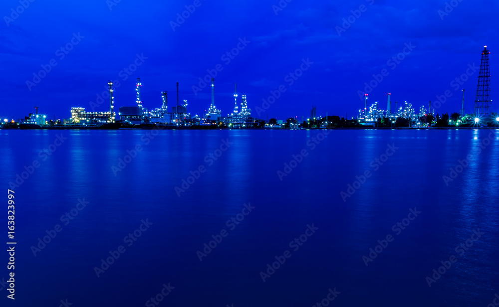 Oil refinery plant at twilight.
Oil refinery plant at twilight.