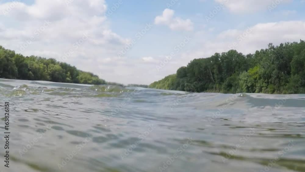 River landscape. Swimmer's Look. Swimmer's hands. Water flow. River landscape. Swimmer's Look. Swimmer's hands. Water flow.