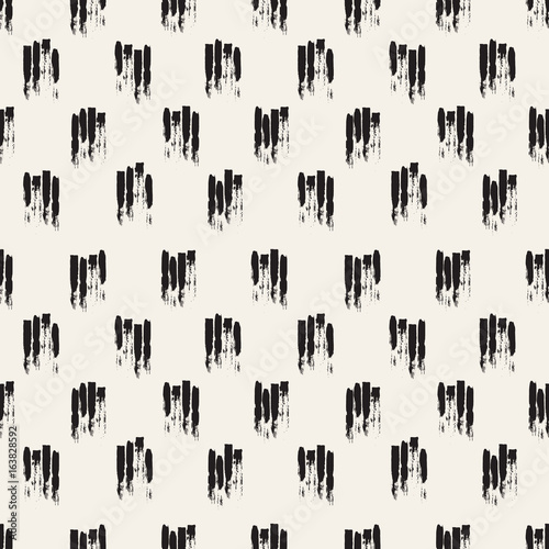 Vector colorful seamless pattern with brush strokes and strokes. Black color on white background. Hand painted grange texture. Ink geometric elements. Fashion modern style. Unusual teen school summer