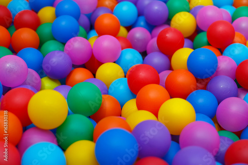 holiday, children's party, a games room, a box filled with small colored balls © John