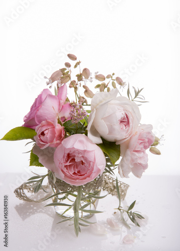 Beautiful English rose flower bouquet on white background