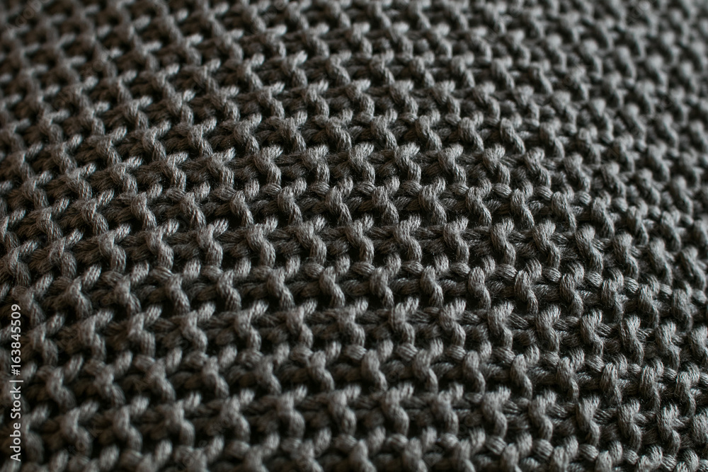 Texture of a soft gray textile with metal color on curved surface Texture of a soft gray textile with metal color on curved surface