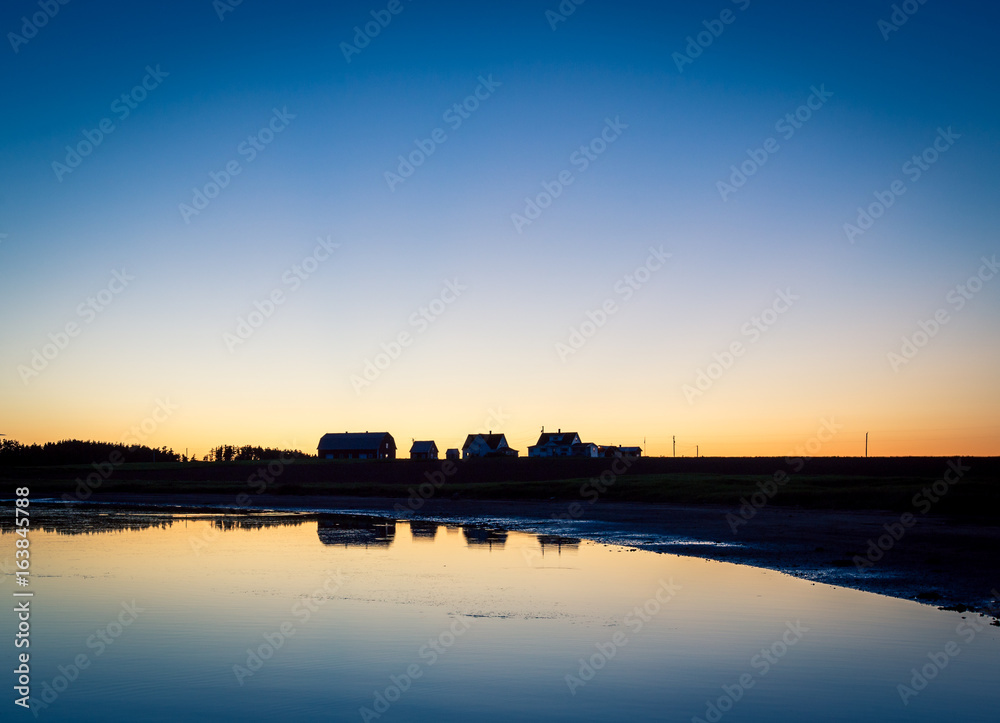 reflection of house and barn
