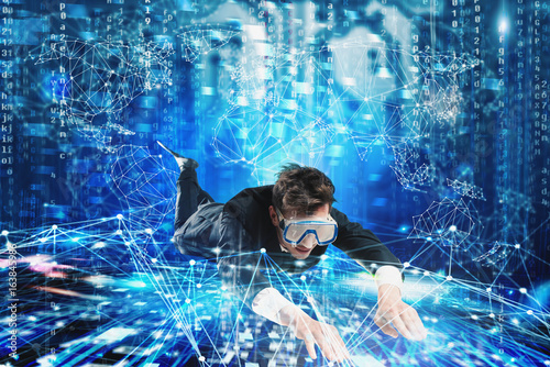 Obraz na plátně Businessman surfing the internet underwater with mask