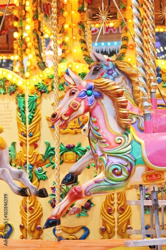 carousel horse merry-go-round horse ride funfair- Stock Photo photograph, image, picture, 