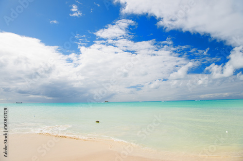 caribbean sea coast line with clean wavy surf ocean water