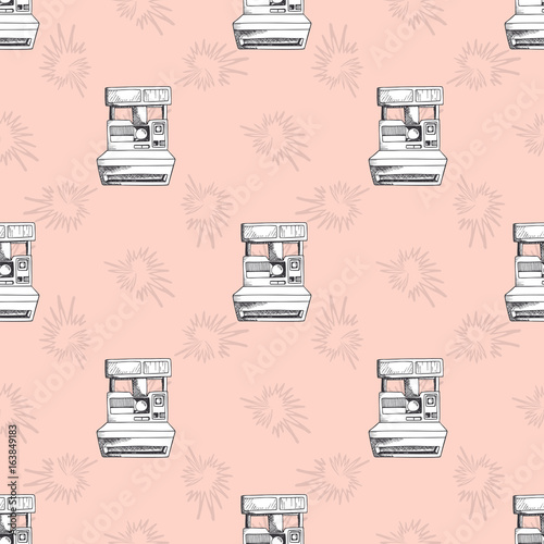 Vector seamless pattern with vintage cameras. Pink background