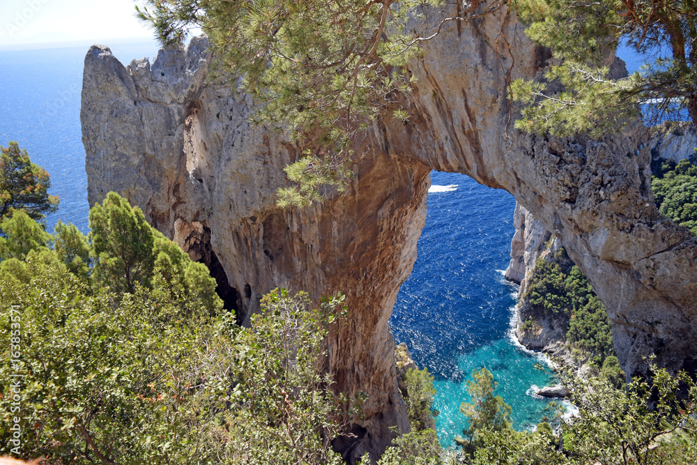 Natural Arch on the east coast of Capri, Italy