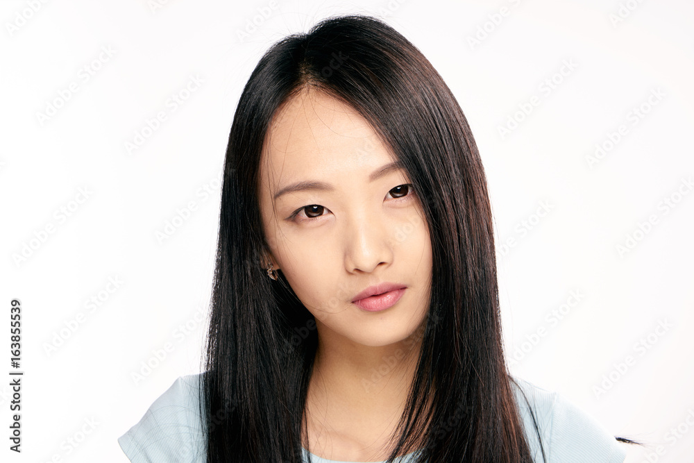 Beautiful young woman on white isolated background, portrait, asian Beautiful young woman on white isolated background, portrait, asian