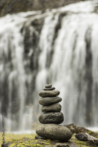 Photography Stack of pebbles and waterfall