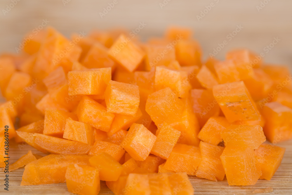 Carrot chopped into cubes ready to be used. Carrot chopped into cubes ready to be used.