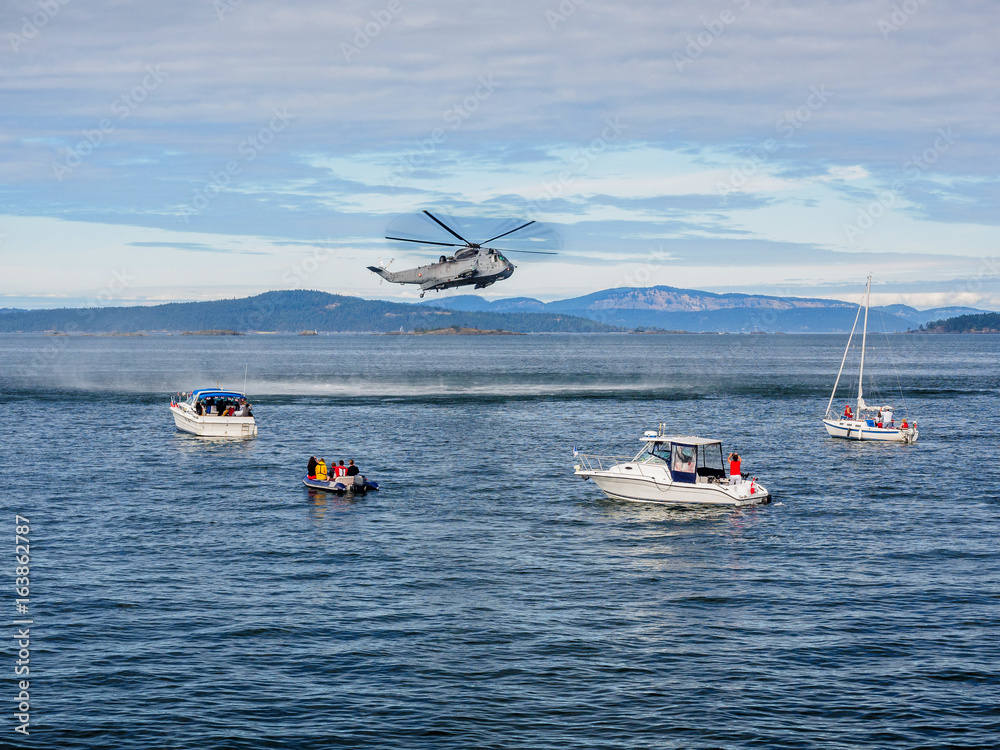 Helicopter crew performing water rescue training