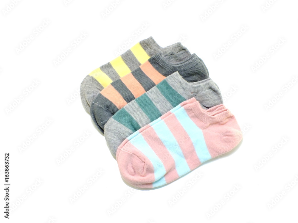 set of several multi colored socks isolated on white background set of several multi colored socks isolated on white background