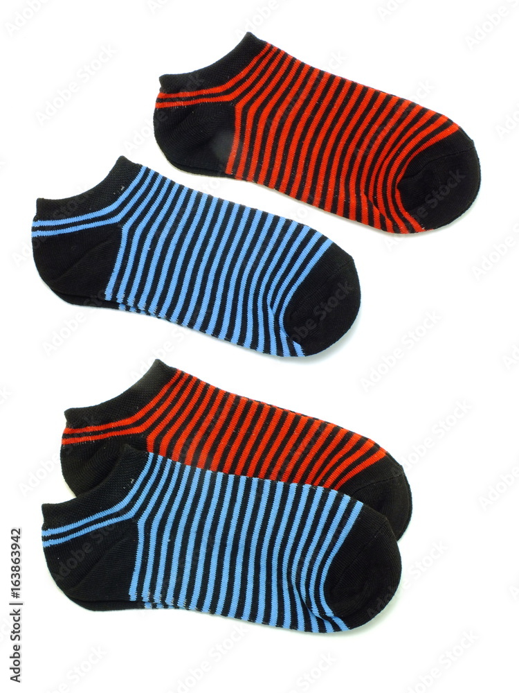 set of several multi colored socks isolated on white background