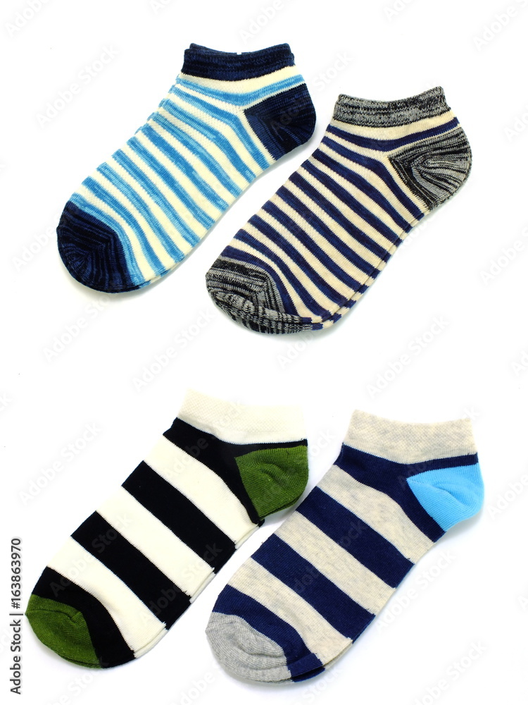set of several multi colored socks isolated on white background set of several multi colored socks isolated on white background