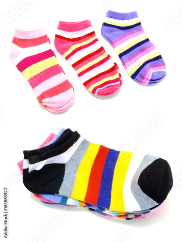 set of several multi colored socks isolated on white background