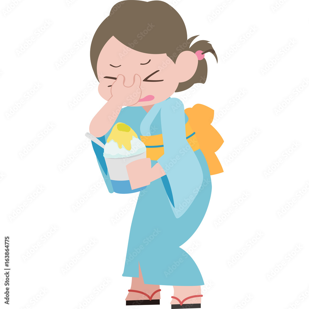 かき氷を食べてキーンとなっている女性 かき氷を食べてキーンとなっている女性
