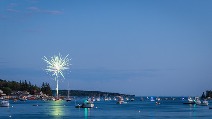 Boothbay Harbor fireworks reflected in the water on the Fourth of July