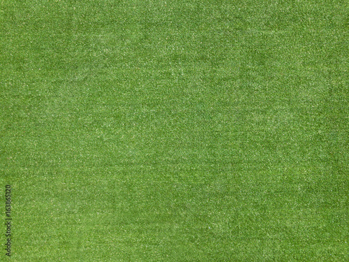 Green football field fake grass texture background © weedezign