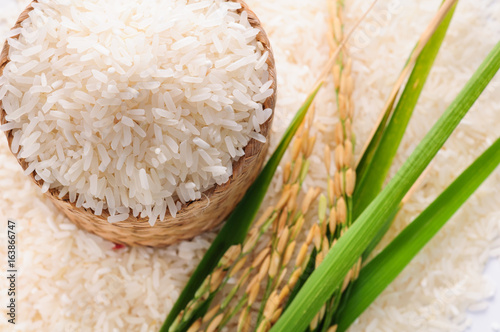 Fotografie Jusmine Rice in bamboo basketry and rice spike