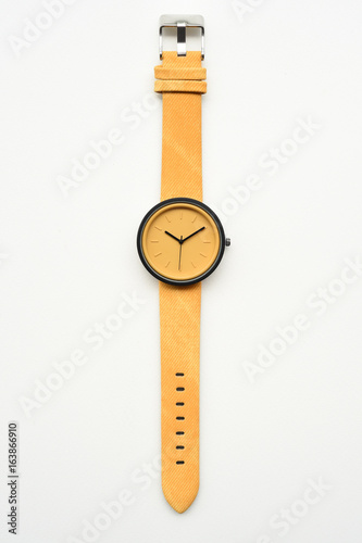 Yellow wristwatches isolated on white background