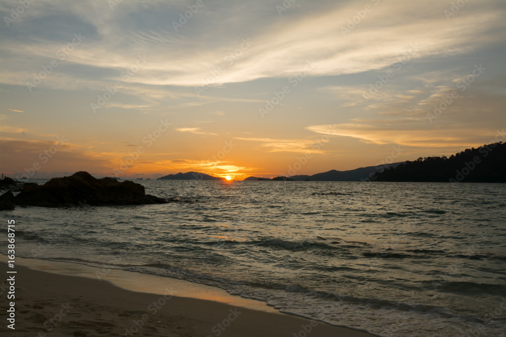 Sunset on the beach at Li pe island in Thailand, gold sea sunset, Cyprus sunset.