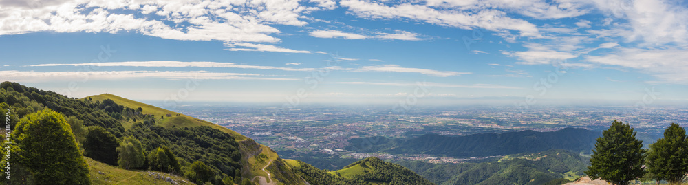 Great landscape on the Padana plain in summer time. Panorama from Linzone Mountain, Bergamo, Italy. 