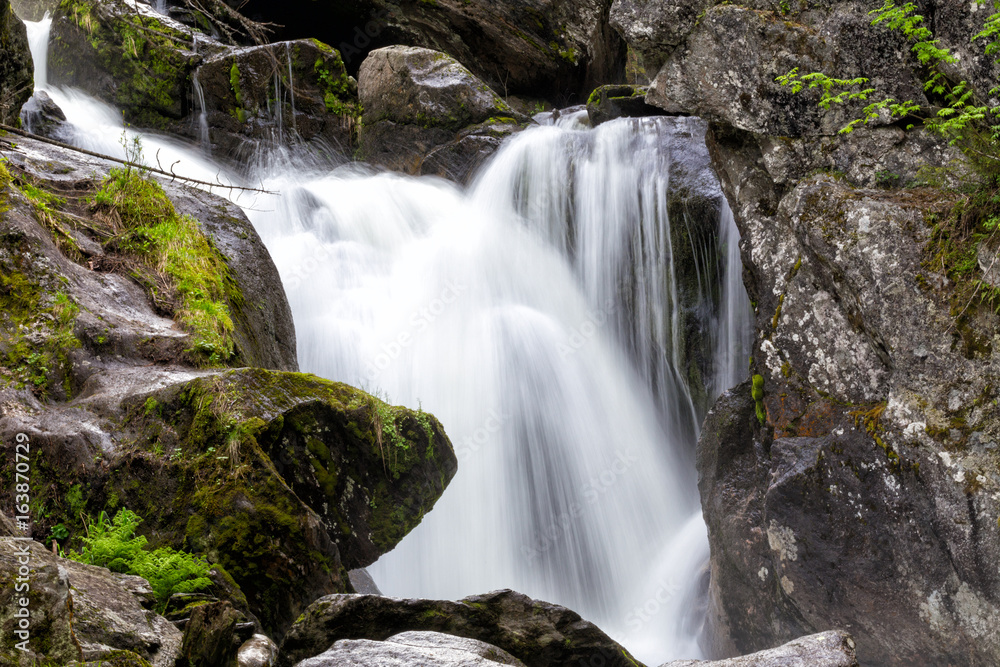 Waterfall on the river Zhigalan. The Kvarkush Range in the North of the Ural Mountains