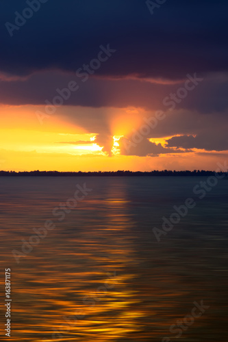 Sunset sky on the lake in south of Thailand.  unfocused image.