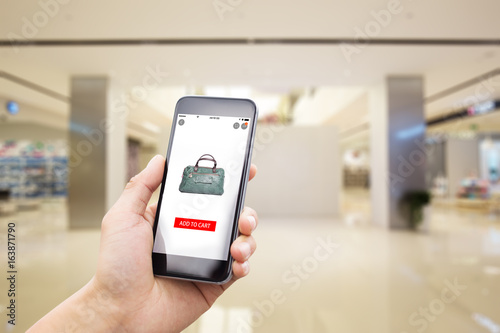 mobile phone with modern shopping mall