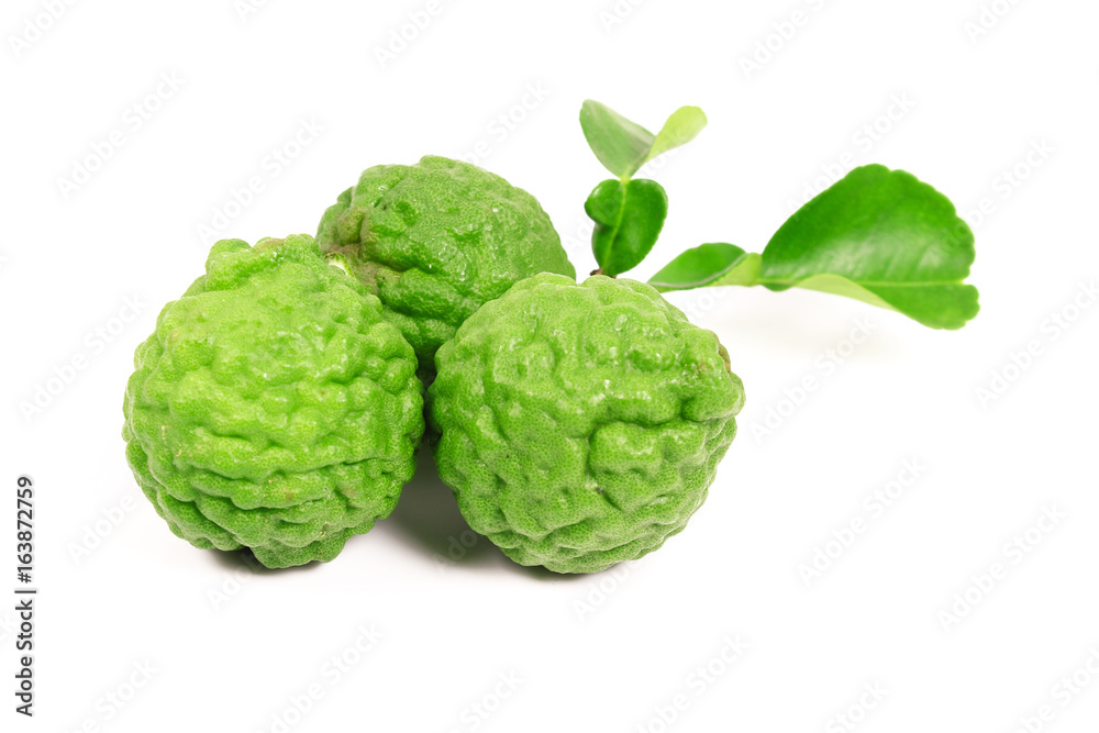 Kaffir lime and kaffir lime leaf on white background Kaffir lime and kaffir lime leaf on white background