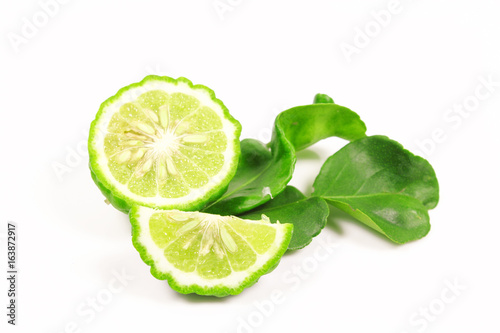 Kaffir lime and kaffir lime leaf on white background