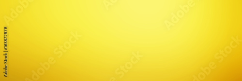 Abstract yellow background with gradient, blur texture with copy space, poster for your design..