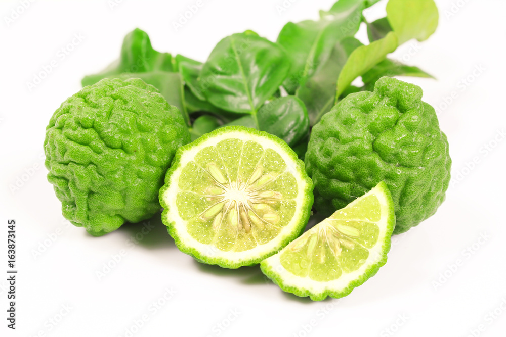 Kaffir lime and kaffir lime leaf on white background Kaffir lime and kaffir lime leaf on white background